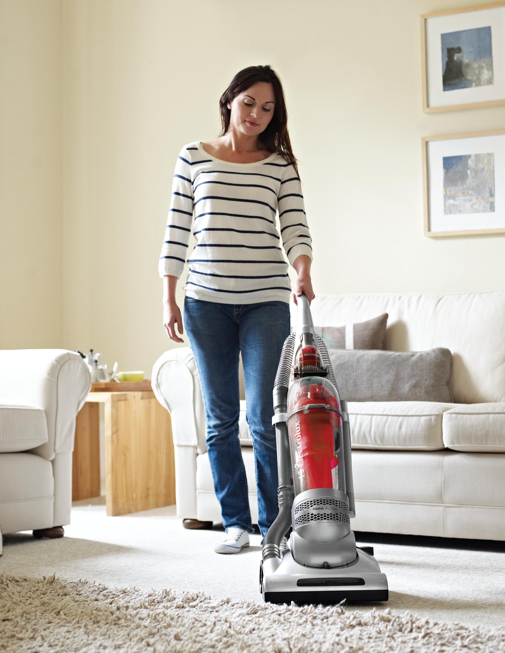 Home vacuum cleaner. Девушка с пылесосом. Уборка пылесосом. Баба пылесос. Пылесосы современные модели.