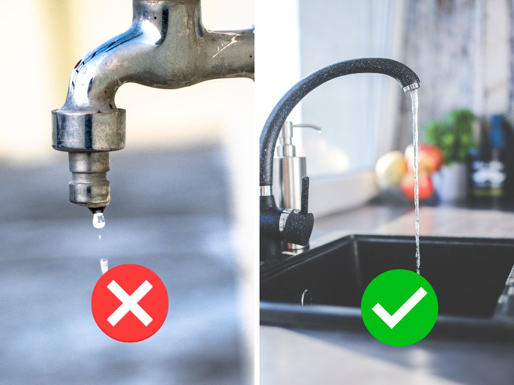 Người dùng kiểm tra nước từ vòi nóng trước khi bật bình nóng lạnh